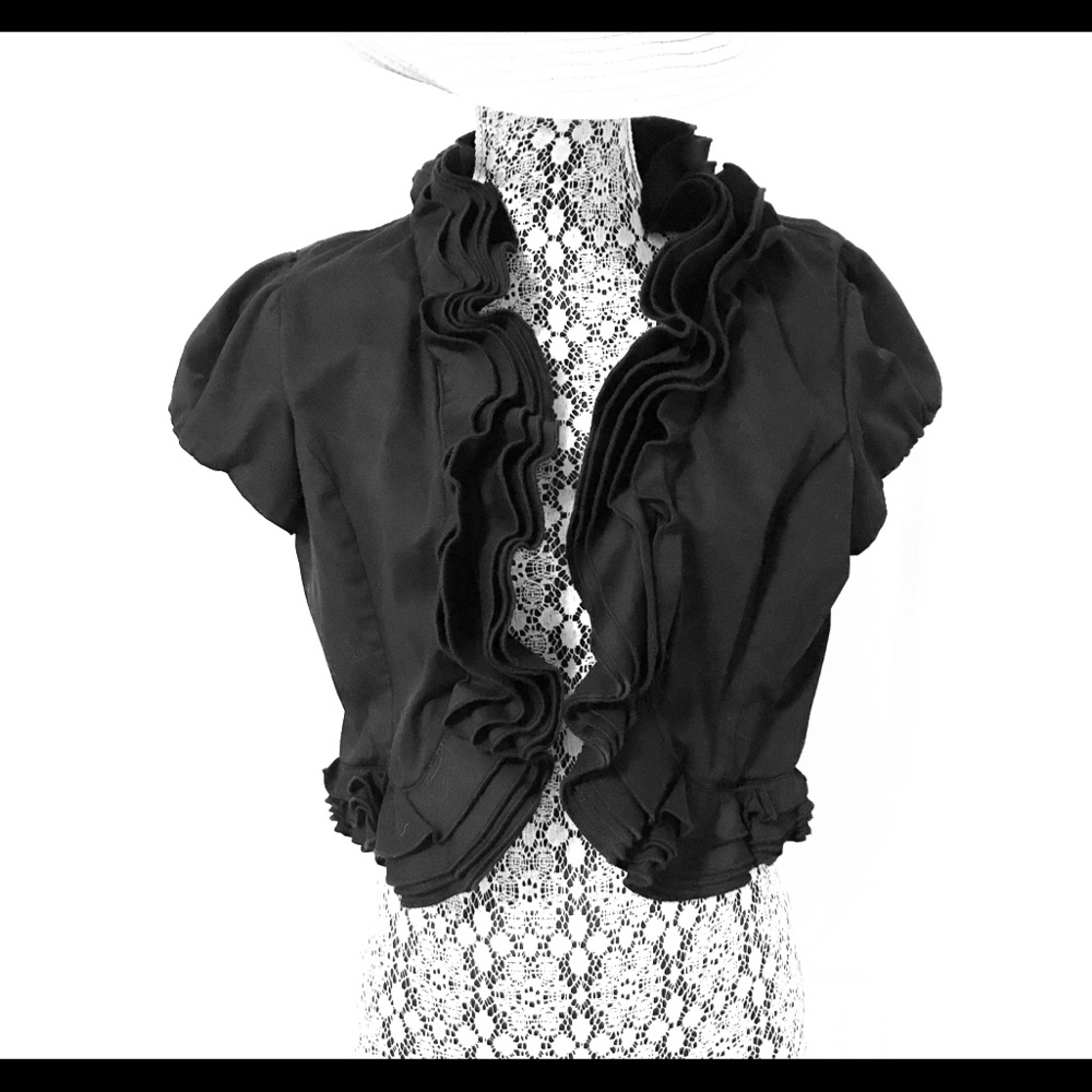 Black Ruffled Cardigan by Dressbarn. Never worn.